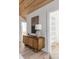 Elegant hallway featuring a wooden console table, lamp, and decorative painting adding a touch of sophistication at 507 Mccants Dr, Mount Pleasant, SC 29464