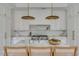 Gourmet kitchen featuring a marble island, pendant lighting, and professional-grade appliances at 507 Mccants Dr, Mount Pleasant, SC 29464