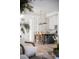 Bright, modern kitchen with white cabinets, marble countertops, island with seating, and pendant lighting at 507 Mccants Dr, Mount Pleasant, SC 29464