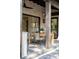 Outdoor dining area with brick columns, featuring a wooden table with seating for six at 507 Mccants Dr, Mount Pleasant, SC 29464
