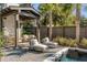 Inviting backyard oasis with a covered outdoor kitchen, comfortable lounge seating, and a refreshing swimming pool at 507 Mccants Dr, Mount Pleasant, SC 29464