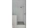 Modern shower with white subway tile, glass enclosure, and sleek fixtures at 507 Mccants Dr, Mount Pleasant, SC 29464
