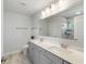 Bathroom with double sinks, shower and modern fixtures at 5115 Cranesbill Way, Johns Island, SC 29455