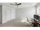 Bedroom featuring a ceiling fan, carpet, a double door closet, and a workspace at 5115 Cranesbill Way, Johns Island, SC 29455