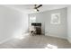 Bedroom featuring a ceiling fan, carpet, and a small desk area in a well-lit space at 5115 Cranesbill Way, Johns Island, SC 29455