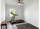 Bright room with an exercise machine, weights and hardwood floors at 5115 Cranesbill Way, Johns Island, SC 29455