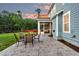 Beautiful backyard featuring a patio with outdoor seating and a lush lawn at 5525 Alpine Dr, Summerville, SC 29483