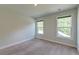 Empty bedroom featuring lots of natural light and neutral colored carpet at 5525 Alpine Dr, Summerville, SC 29483