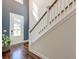 Welcoming foyer with hardwood floors, a staircase, and natural light at 5525 Alpine Dr, Summerville, SC 29483