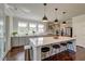 Modern kitchen with a large center island, stainless steel appliances, and pendant lighting at 5525 Alpine Dr, Summerville, SC 29483