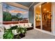 Comfortable covered patio with stylish seating and a view of the backyard at 5525 Alpine Dr, Summerville, SC 29483