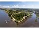 Beautiful aerial view of the coastal community with a pier and winding nature trails on a sunny day at 601 King Haven Ln, Johns Island, SC 29455