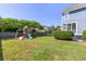 Spacious backyard with playground equipment, ideal for Gathering fun and recreation at 601 King Haven Ln, Johns Island, SC 29455