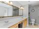 Spacious bathroom features a dual sink vanity with an oversized mirror, a toilet, and a shower at 601 King Haven Ln, Johns Island, SC 29455