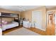 Cozy bedroom with bunk bed, desk area, and hardwood floors offers a comfortable space at 601 King Haven Ln, Johns Island, SC 29455
