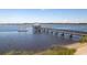 Scenic view of a picturesque pier with a covered area, docks, and serene water views at 601 King Haven Ln, Johns Island, SC 29455