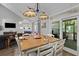 Dining area flows seamlessly into the living room and boasts a door to the backyard at 6242 Fieldstone Cir, Charleston, SC 29414