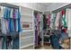 Walk-in closet with custom shelving and racks, perfect for organizing clothes and accessories at 6242 Fieldstone Cir, Charleston, SC 29414