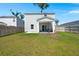 Spacious backyard with green lawn, patio, and fenced perimeter offering privacy and outdoor enjoyment at 630 Jancus St, Charleston, SC 29414