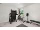 Bright exercise room with a treadmill, elliptical machine, fan, and bench for a complete workout space at 630 Jancus St, Charleston, SC 29414