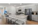 Modern kitchen with granite countertops, stainless steel appliances, and a breakfast bar with seating at 630 Jancus St, Charleston, SC 29414