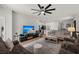 Spacious living room with modern furniture, a large TV, a cozy rug, and great lighting at 630 Jancus St, Charleston, SC 29414