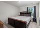 Comfortable bedroom featuring a bed with pillows, side table, and window, creating a relaxing and inviting space at 630 Jancus St, Charleston, SC 29414