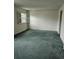 Bright bedroom features carpeted floor, natural light and ample closet space at 70 Legare St, Charleston, SC 29401