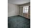 Bedroom featuring carpet, built-in shelving with window and natural light at 70 Legare St, Charleston, SC 29401