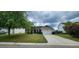 Charming single Gathering home with manicured lawn and a two-car garage at 7019 Lanier St, Hanahan, SC 29410