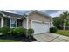 Close-up of the home's garage and landscaping detail at 7019 Lanier St, Hanahan, SC 29410