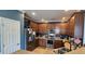 Kitchen with stainless steel appliances, wooden cabinets, and modern fixtures offering style and functionality at 7019 Lanier St, Hanahan, SC 29410