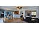 Open-concept space featuring bar seating, dining area, and view into the cozy living room, a great layout at 7019 Lanier St, Hanahan, SC 29410