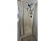 Modern shower featuring sleek glass doors, a handheld shower head, and a clean design for a spa-like experience at 7019 Lanier St, Hanahan, SC 29410
