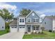 Charming two-story home with a two-car garage and beautifully landscaped front yard at 714 N Hickory St # 13, Summerville, SC 29483