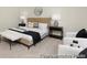Relaxing main bedroom showcasing a well-appointed bed, elegant nightstands, and cozy seating at 714 N Hickory St # 13, Summerville, SC 29483