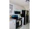 Bright kitchen featuring new appliances, white cabinets, and granite countertops at 7774 Ginger Ln, North Charleston, SC 29420