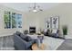 Tastefully decorated living room with modern furnishings, a cozy fireplace, and plenty of natural light at 7869 High Maple Cir, North Charleston, SC 29418