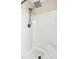 Modern walk-in shower with white tiled walls and a chrome rain shower head at 7869 High Maple Cir, North Charleston, SC 29418