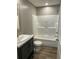 Full bathroom featuring a single sink vanity with shaker cabinets and a tub/shower combo at 852 Lawyer Ln, Cross, SC 29436