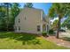 Charming condo with well-maintained lawn and mature trees on a bright, sunny day at 9098 Maple Grove Dr, Summerville, SC 29485
