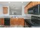 Functional kitchen with black appliances and plenty of cabinet space at 9098 Maple Grove Dr, Summerville, SC 29485