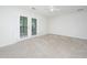 Comfortable living room with plush carpet and a glass door with an exterior view at 9098 Maple Grove Dr, Summerville, SC 29485