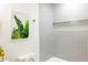 Bathroom featuring a gray tiled shower with a botanical print and a toilet at 10 Bayshore Blvd, Goose Creek, SC 29445