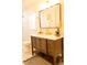 Bathroom features a dark wood vanity with drawers, a large mirror and a decorative plant at 10 Bayshore Blvd, Goose Creek, SC 29445