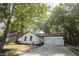 Charming single-story home with a well-manicured lawn, inviting curb appeal, and a two car garage at 10 Bayshore Blvd, Goose Creek, SC 29445