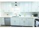 Bright kitchen featuring stainless appliances, white cabinets with gold pulls, and quartz countertops at 10 Bayshore Blvd, Goose Creek, SC 29445