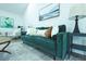 Elegant living space showcases a plush green sofa complemented by refined furnishings and tasteful decor at 10 Bayshore Blvd, Goose Creek, SC 29445