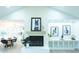 Stunning view of living room fireplace with open floor plan to dining area, and vaulted ceiling at 10 Bayshore Blvd, Goose Creek, SC 29445