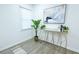 Bright living room with wood floors, complemented by a modern console table and decorative plants at 10 Bayshore Blvd, Goose Creek, SC 29445